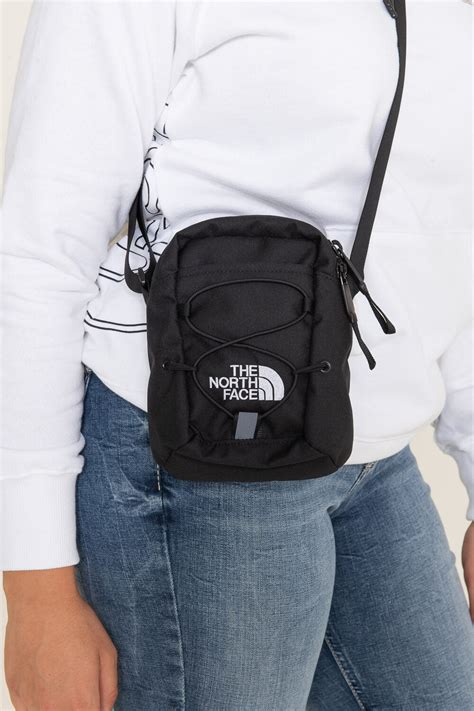 take her gucci bag and the north face